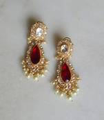 Sophisticated kundan jadau earrings with red doublet stone