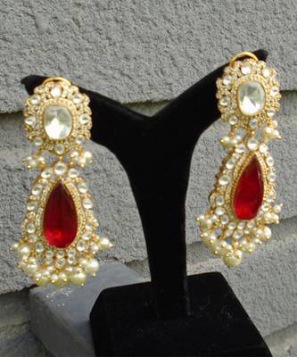 Sophisticated kundan jadau earrings with red doublet stone 2