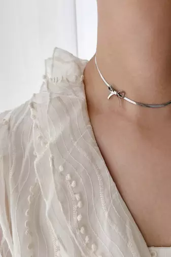 Silver plated bow chain