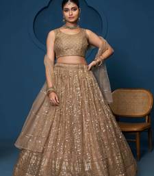 Graceful soft net Fabric Sequins zari embroidery work brown Lehenga For Festival
