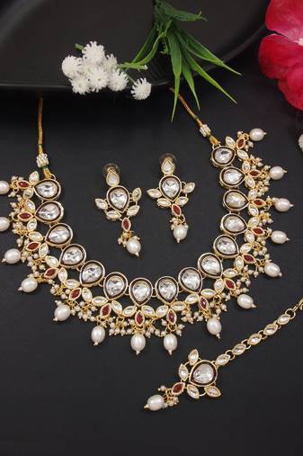 traditional pearl kundan studded floral necklace with earring maang tikka set