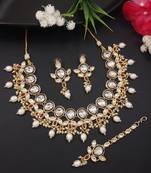 traditional pearl kundan studded floral necklace with earring maang tikka set