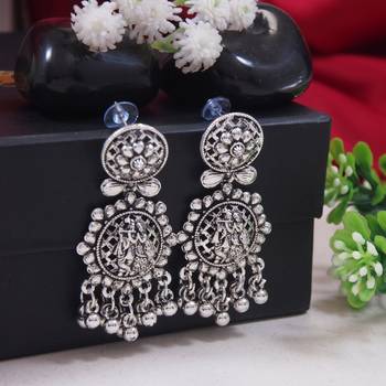 silver oxidised afghani style radhe krishna flute figurative designer earrings 1