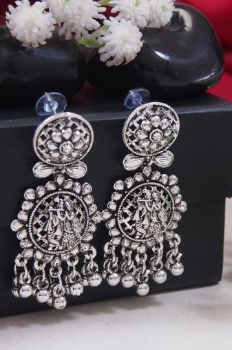 silver oxidised afghani style radhe krishna flute figurative designer earrings