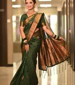 Green woven kanjivaram cotton silk saree with blouse piece