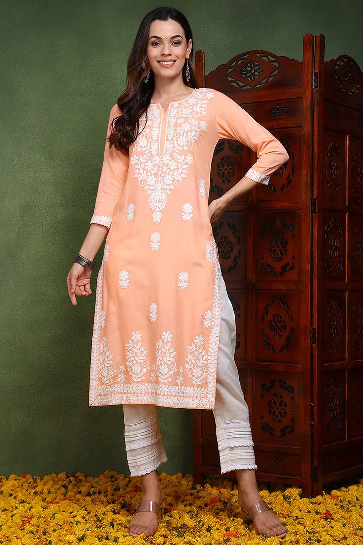 Women peach embroidered viscose rayon chikankari kurtis