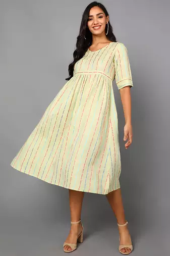 Women cream printed cotton kurti
