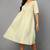 Women cream printed cotton kurti