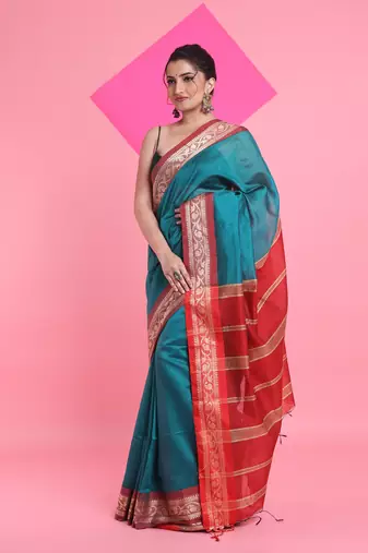 Teal cotton silk saree with nakshi borders