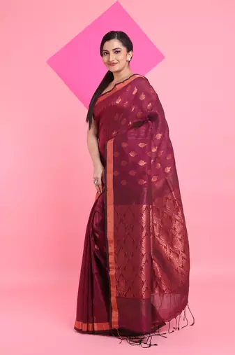 Magenta linen saree with nakshi pallu