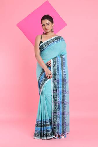 Sea green cotton saree with texture borders