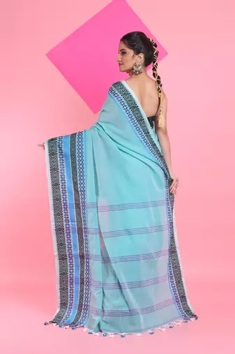 Sea green cotton saree with texture borders
