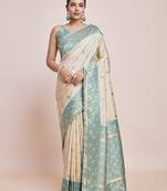 Exquisite Designs With This Cream Banarasi Satin silk Saree