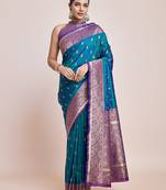 Exquisite Designs With This Teal Banarasi Satin silk Saree