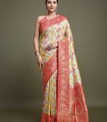 Glamour And Tradition With This Zari Woven Red And Cream Banarasi silk blend Saree