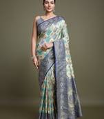 Glamour And Tradition With This Zari Woven Navy Blue And Cream Banarasi silk blend Saree