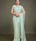 Women'S Light Green Soft Net Saree With Sequin Embellished Border And Pallu