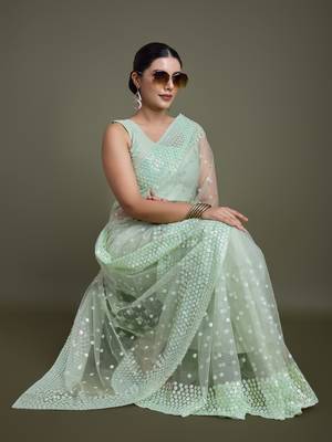 Light Green Net Saree With Sequin Embellished Border And Pallu 3
