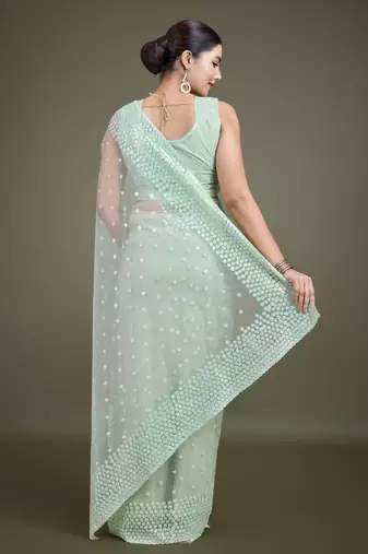 Light Green Net Saree With Sequin Embellished Border And Pallu