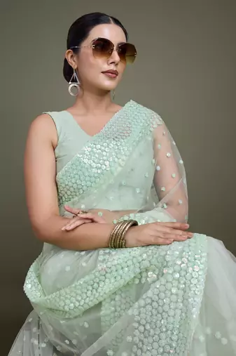 Light Green Net Saree With Sequin Embellished Border And Pallu