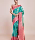 Glamour And Tradition With This Zari Woven Faux Banarasi Tissue Silk Turquoise Saree
