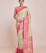 Glamour And Tradition With This Zari Woven Faux Banarasi Tissue Silk Cream Saree