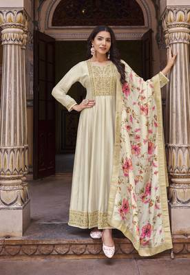 Cream embroidered heavy silk semi stitched anarkali suit 1