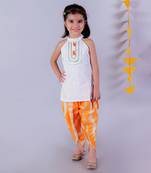 white girls cotton kurta and orange dhoti ethnic set