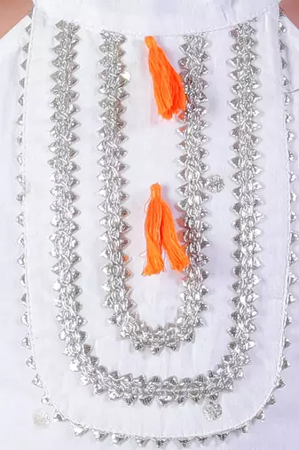 white girls cotton kurta and orange dhoti ethnic set