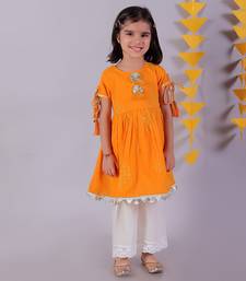 orange cotton kurta and white pyjama ethnic set