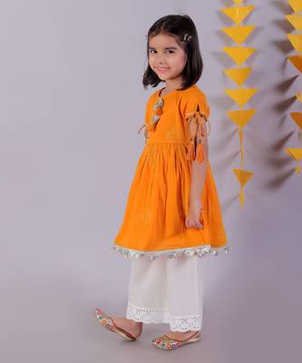 orange cotton kurta and white pyjama ethnic set 4