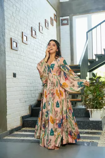 Peach smart and looks chinon graceful partywear gown
