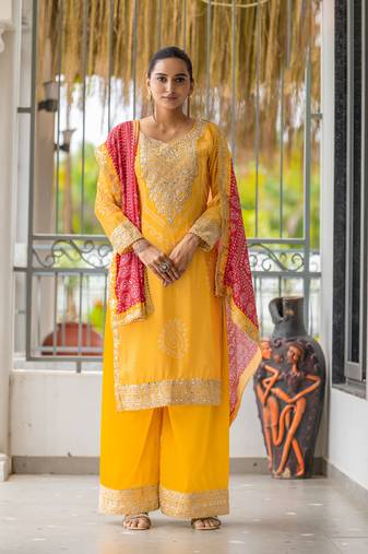 Yellow heavy designer palazzo dress designer with bandhani printed with zari embroidery work for rich glam look