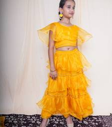 A mellow yellow lehnga set for baby girls