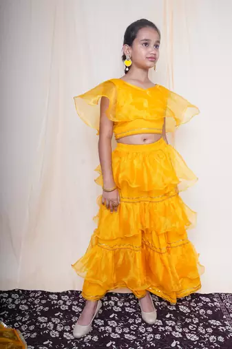 A mellow yellow lehnga set for baby girls