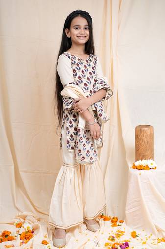 bagru handblock printed quarter frill sleeves short kurta, paired with beige sharara