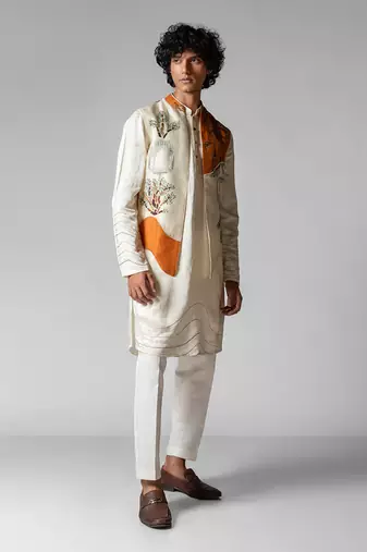 Tangy orange embroidered satin kurta jacket set
