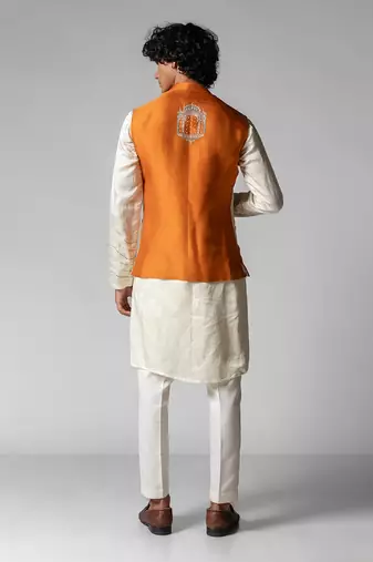 Tangy orange embroidered satin kurta jacket set