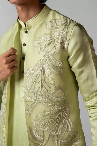 Pista green embroidered satin kurta jacket set
