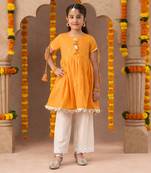 orange cotton kurta and white pyjama ethnic set