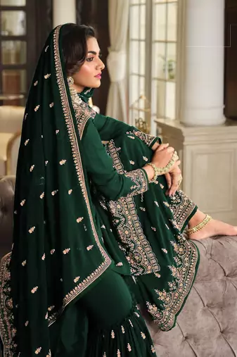 Green embroidered faux georgette semi stitched plazzo suit