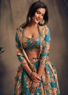 Stunning Teal Organza Zari & Sequins Wedding Lehenga 5