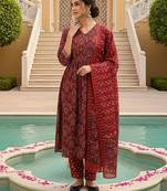 Women Red color cotton blend printed fancy flared kurta trousers with dupata
