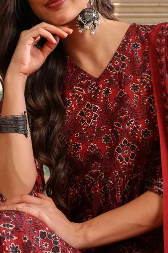 Women Red color cotton blend printed fancy flared kurta trousers with dupata