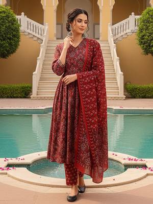 Women Red color cotton blend printed fancy flared kurta trousers with dupata 4