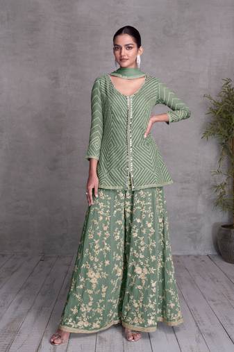Dusty green embroidered chinnon free size stitched straight style palazzo suit. (size upto 42)