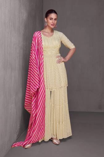 Off white embroidered chinnon free size stitched anarkali style palazzo suit. (size upto 42)