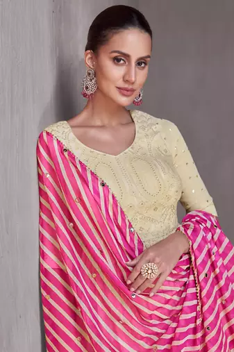 Off white embroidered chinnon free size stitched anarkali style palazzo suit. (size upto 42)