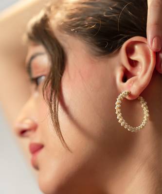 Gold orbit charm earrings 1