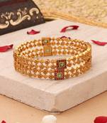 Whimsical Elegance: Gold-Plated Bangles with Delicate Shapes and Floral Accents